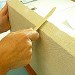 Lissage d'un chant de carton